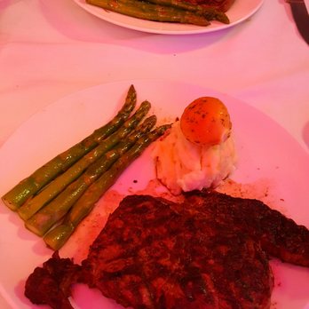 Broadway Grill - His and hers ribeye steaks~ (prime rib was sold out...) one regular and one cajun - American Near Me - Burlingame, California