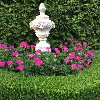Craig Adam's Landscaping - a garden with pink flowers - Landscaping Near Me - Wixom, Michigan Craig Adam's Landscaping - a garden with pink flowers - Landscaping Near Me - Wixom, Michigan
