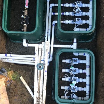 Classic Grounds Care - inner workings of an irrigation system - Tree Services Near Me