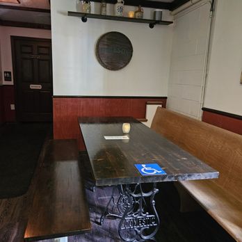 Matthews Social House - a table and benches - Whiskey Bars Near Me - Matthews, North Carolina Matthews Social House - a table and benches - Whiskey Bars Near Me - Matthews, North Carolina