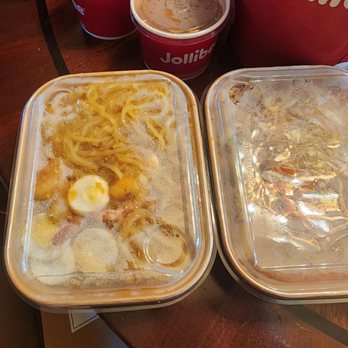 Seafood City Supermarket - Items from the hot food section: palabok (left) and pancit (right) - Seafood Markets Near Me - Hayward, California