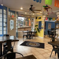 The Happy Wanderer - Another inside view with outdoor patio @ The Happy Wanderer.