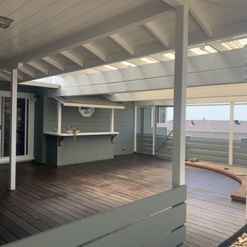 Native Design Painting - Our covered deck - transformed from dark and woodsy to light and resorty. - Painters Near Me
