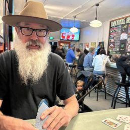 Inside of Hopnonymous II on a Tuesday night!  Was hopping at 5:30pm!  Great designs on their coasters!  Felt very welcomed!