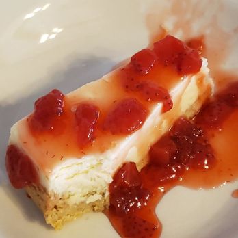 Wayne's Grill - Cheesecake with strawberry sauce..looks small, but perfect after too much to eat - Chicken Wings Near Me - Livingston, Tennessee Wayne's Grill - Cheesecake with strawberry sauce..looks small, but perfect after too much to eat - Chicken Wings Near Me - Livingston, Tennessee