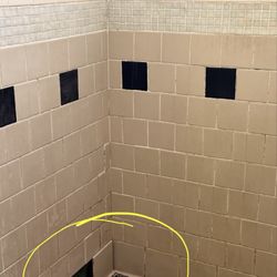Dirty with tiles falling off walls. It has been like this for years.