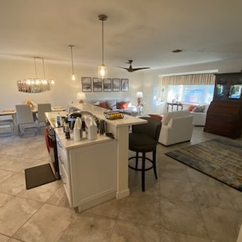 CleanFlorida - Pre cleaned living room, kitchen island, and dining room. - Home Cleaning Near Me - Naples, Florida CleanFlorida - Pre cleaned living room, kitchen island, and dining room. - Home Cleaning Near Me - Naples, Florida