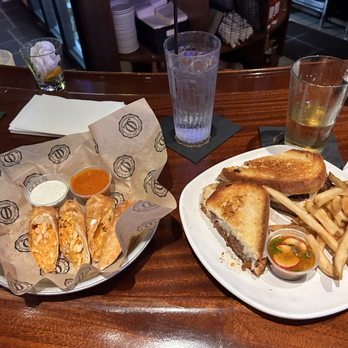 Timothy O'Toole's Pub - Buffalo Chicken Egg Rolls and barría Birria Grilled Cheese - Sports Bars Near Me - Chicago, Illinois