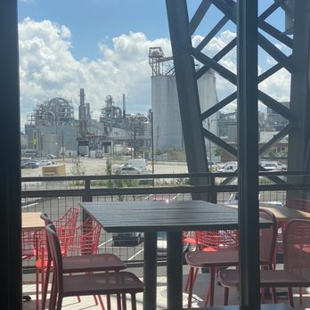 Back 9 Golf & Entertainment - The other side can be seen the industrial area, there's also tons of outdoor seating - Bars Near Me - Indianapolis, Indiana