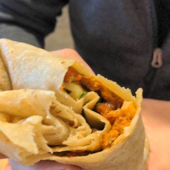 The Taco Stand - Al pastor burrito. Notice the excess tortilla tucked under at the end of the burrito. Not unpleasant because the tortilla was so fresh. - Food Stands Near Me - La Jolla, California The Taco Stand - Al pastor burrito. Notice the excess tortilla tucked under at the end of the burrito. Not unpleasant because the tortilla was so fresh. - Food Stands Near Me - La Jolla, California