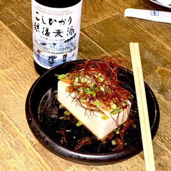 Susuru - Hiyayakko Tofu: chilled silken tofu, crispy sakura shrimp, grated ginger, scallions, okonomi sauce - Izakaya Near Me - Orlando, Florida Susuru - Hiyayakko Tofu: chilled silken tofu, crispy sakura shrimp, grated ginger, scallions, okonomi sauce - Izakaya Near Me - Orlando, Florida