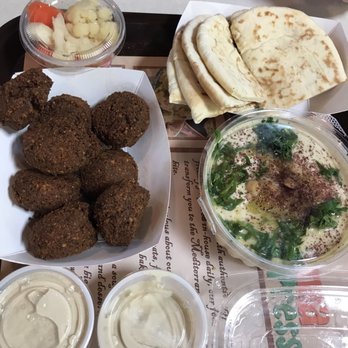 Shawarma Press - Assorted pickles, pits, hummus and falafel - Mediterranean Near Me - Irving, Texas Shawarma Press - Assorted pickles, pits, hummus and falafel - Mediterranean Near Me - Irving, Texas