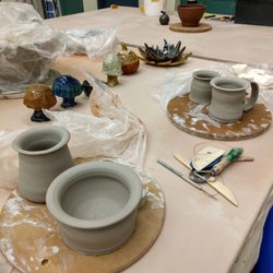 City Arts Centre - Grey clay being thrown in pottery class.