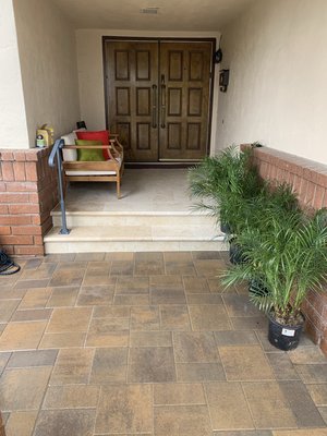 Full front yard renovation - Full front yard renovation includes driveway, path, patio, porch, fence, retaining wall and landscaping.