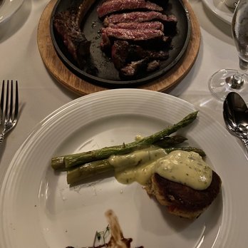 Bridgeman's Chophouse - Medium Rare Tomahawk, Asparagus, Crab Cake. - Steakhouses Near Me - Chattanooga, Tennessee Bridgeman's Chophouse - Medium Rare Tomahawk, Asparagus, Crab Cake. - Steakhouses Near Me - Chattanooga, Tennessee