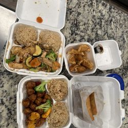 Rice Express - Happy family, fried dumplings, orange peel chicken, & chicken egg rolls
