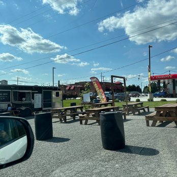 Chelsity’s - a parking lot with picnic tables - Food Trucks Near Me - Lynchburg, Virginia
