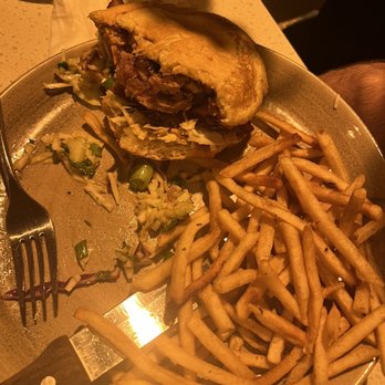 Beach House - Tuna burger (Someone couldn't wait for me to take a picture.) - Bars Near Me - Pompano Beach, Florida