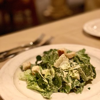 Tuscany Grill - a plate of salad on a table - Italian Near Me - Henderson, Nevada Tuscany Grill - a plate of salad on a table - Italian Near Me - Henderson, Nevada