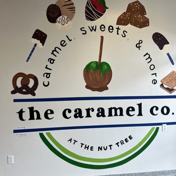 The Caramel Company - a man standing in front of a sign - Chocolatiers & Shops Near Me - Vacaville, California The Caramel Company - a man standing in front of a sign - Chocolatiers & Shops Near Me - Vacaville, California