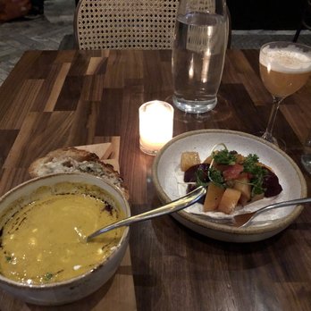 Bowery Road - (Left to right) butternut squash soup, beet salad, Vegan Brandy Flip - New American Near Me - New York, New York