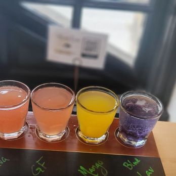 Locals Only - Mimosa flight- from left to right Guava, grapefruit, peach and Blueberry lavender - Breakfast & Brunch Near Me - Rochester, New York