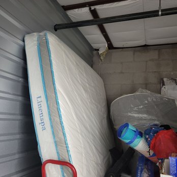 Extra Space Storage - The hole on top where the rats probably fell through. They actually chewed this mattress upppp. - Self Storage Near Me - Phoenix, Arizona