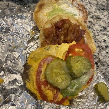 Five Guys - a sandwich on tin foil with pickles - Burgers Near Me - Lubbock, Texas Five Guys - a sandwich on tin foil with pickles - Burgers Near Me - Lubbock, Texas