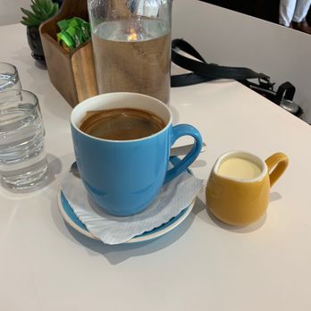 Warm Discussions Cafe - Long black with cream - Cafes Near Me - Sandgate, QLD Warm Discussions Cafe - Long black with cream - Cafes Near Me - Sandgate, QLD