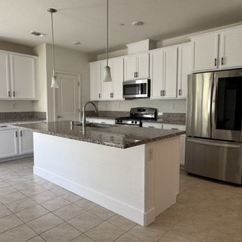 Straight Edge Painting - White kitchen cabinets- the after - Painters Near Me