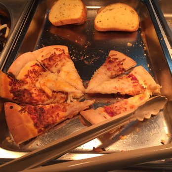 Komi Buffet - Frozen looking pizza that's been under the heat lamp for a little TOO long. - Buffets Near Me - Buena Park, California Komi Buffet - Frozen looking pizza that's been under the heat lamp for a little TOO long. - Buffets Near Me - Buena Park, California