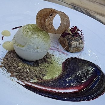 Mana Restaurant - Fir tip Dusted mace coconut ice cream and Rose Maple marshmallow with the Huckleberry coulis and sunflower seed cacao nib Tuile! - New American Near Me - Leavenworth, Washington Mana Restaurant - Fir tip Dusted mace coconut ice cream and Rose Maple marshmallow with the Huckleberry coulis and sunflower seed cacao nib Tuile! - New American Near Me - Leavenworth, Washington
