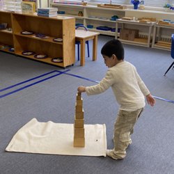 Long Island Montessori School - Building the Tower of cubes