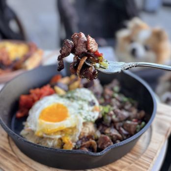 Whisper - Cast Iron Stone Axe: Beef finger meat, rice, sunny side up egg, potato medley ($36) - Breakfast & Brunch Near Me - San Mateo, California Whisper - Cast Iron Stone Axe: Beef finger meat, rice, sunny side up egg, potato medley ($36) - Breakfast & Brunch Near Me - San Mateo, California