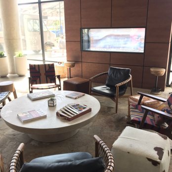 Origin Hotel Red Rocks - Indoor lounge by the fire with a Fender acoustic set up for anyone to play - Hotels Near Me - Golden, Colorado Origin Hotel Red Rocks - Indoor lounge by the fire with a Fender acoustic set up for anyone to play - Hotels Near Me - Golden, Colorado