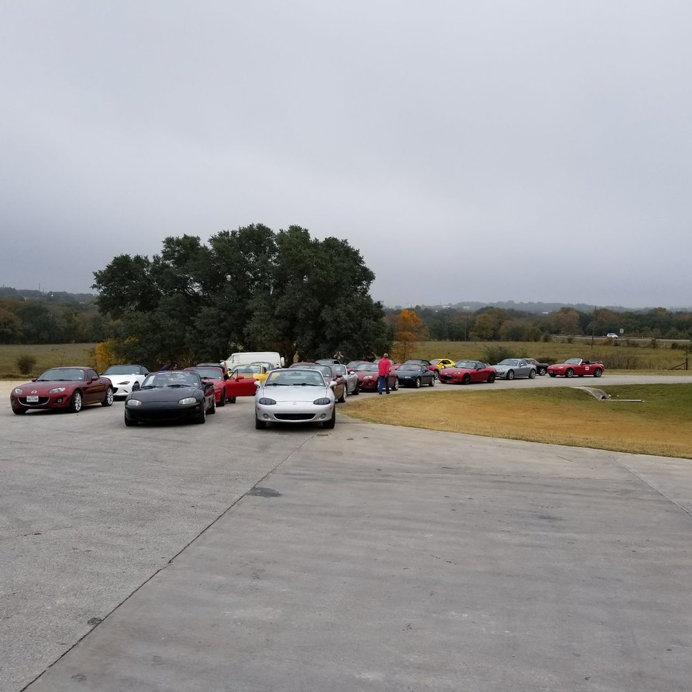 a parking lot full of cars a parking lot full of cars