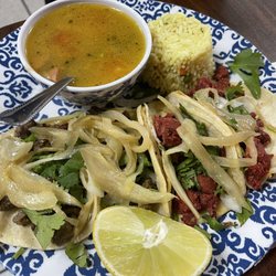 Don Pedro's Pupuseria y Taqueria - Plate off for tacos, two Al pastor and two fajitas tacos
