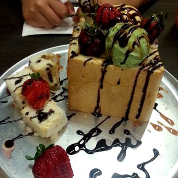 Lazi Cow - Chocolate Lover Brick Toast $8.50 with green tea and vanilla bean ice cream - Desserts Near Me - Davis, California Lazi Cow - Chocolate Lover Brick Toast $8.50 with green tea and vanilla bean ice cream - Desserts Near Me - Davis, California