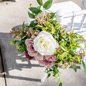 Violette's Flowers - Amazing seat arrangements, were also reused for tables inside! - Florists Near Me - San Gabriel, California Violette's Flowers - Amazing seat arrangements, were also reused for tables inside! - Florists Near Me - San Gabriel, California