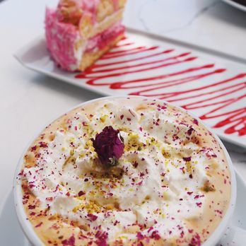 Utopia Caffe - ~utopia latte (pistachio rose) and raspberry cake - Breakfast & Brunch Near Me - Tustin, California
