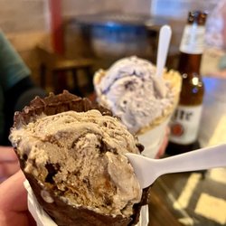 Silver Saddle Saloon - Chocolate peanut butter cup ice cream in a chocolate waffle cone and blueberry cheesecake ice cream in a freshly made waffle cone!