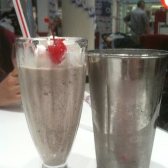 Ruby's Diner - Oreo shake. There's even more in the silver cup. - Diners Near Me - Costa Mesa, California