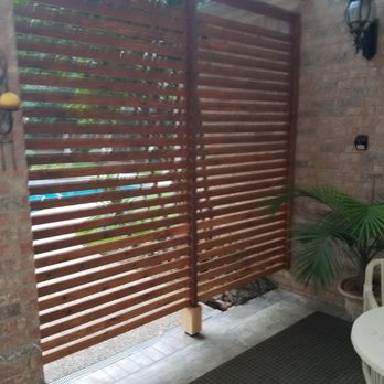 Jlt Contractors - a patio with a privacy screen - General Contractors Near Me Jlt Contractors - a patio with a privacy screen - General Contractors Near Me