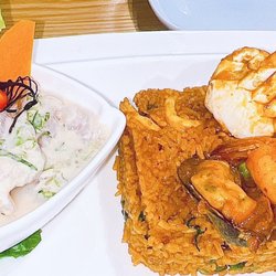 Stancia Peruvian Fusion Restaurant - ARROZ CON MARISCOS: Peruvian Style Seafood Paella Served With A Side Of Basa Ceviche