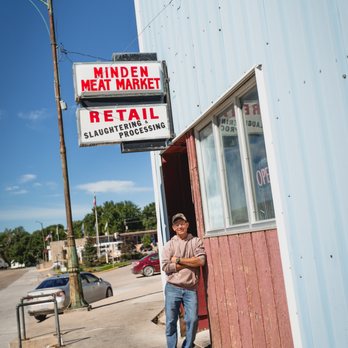 Minden Meat Market - a man leaning against a building - Meat Shops Near Me - Minden, Iowa Minden Meat Market - a man leaning against a building - Meat Shops Near Me - Minden, Iowa