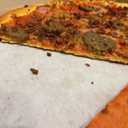 Genova's Pizza & Restaurant - Like thin crust? Try no crust, with burnt dog food toppings!