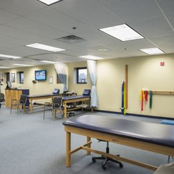 Atlantic Physical Therapy Center - The large open treatment space inside the Shrewsbury location of Atlantic Physical Therapy Center.