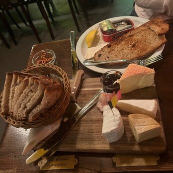 Le Poechenellekelder - Cheese board and sardines. - Beer Bar Near Me - Brussels, BRU Le Poechenellekelder - Cheese board and sardines. - Beer Bar Near Me - Brussels, BRU