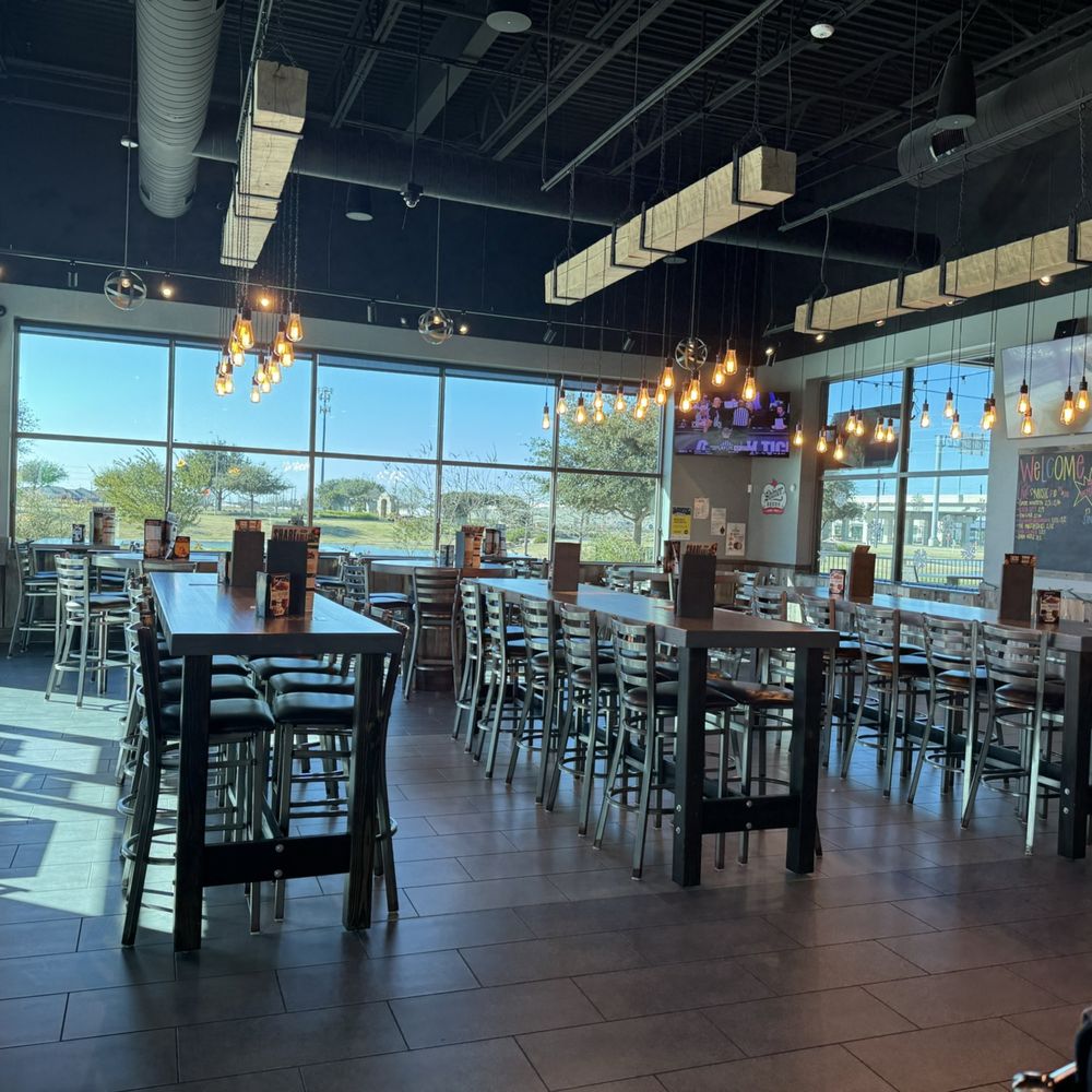The Brass Tap - Interior seating with various sized tables - Beer Bar Near Me - Richmond, Texas The Brass Tap - Interior seating with various sized tables - Beer Bar Near Me - Richmond, Texas
