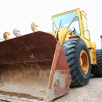 Berkeley Garage - Yard Equipment Photo by: Diiamond Eyez Designs - Auto Repair Near Me - Denver, Colorado